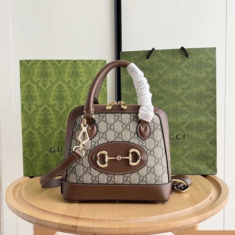 G*u*i top handle bags